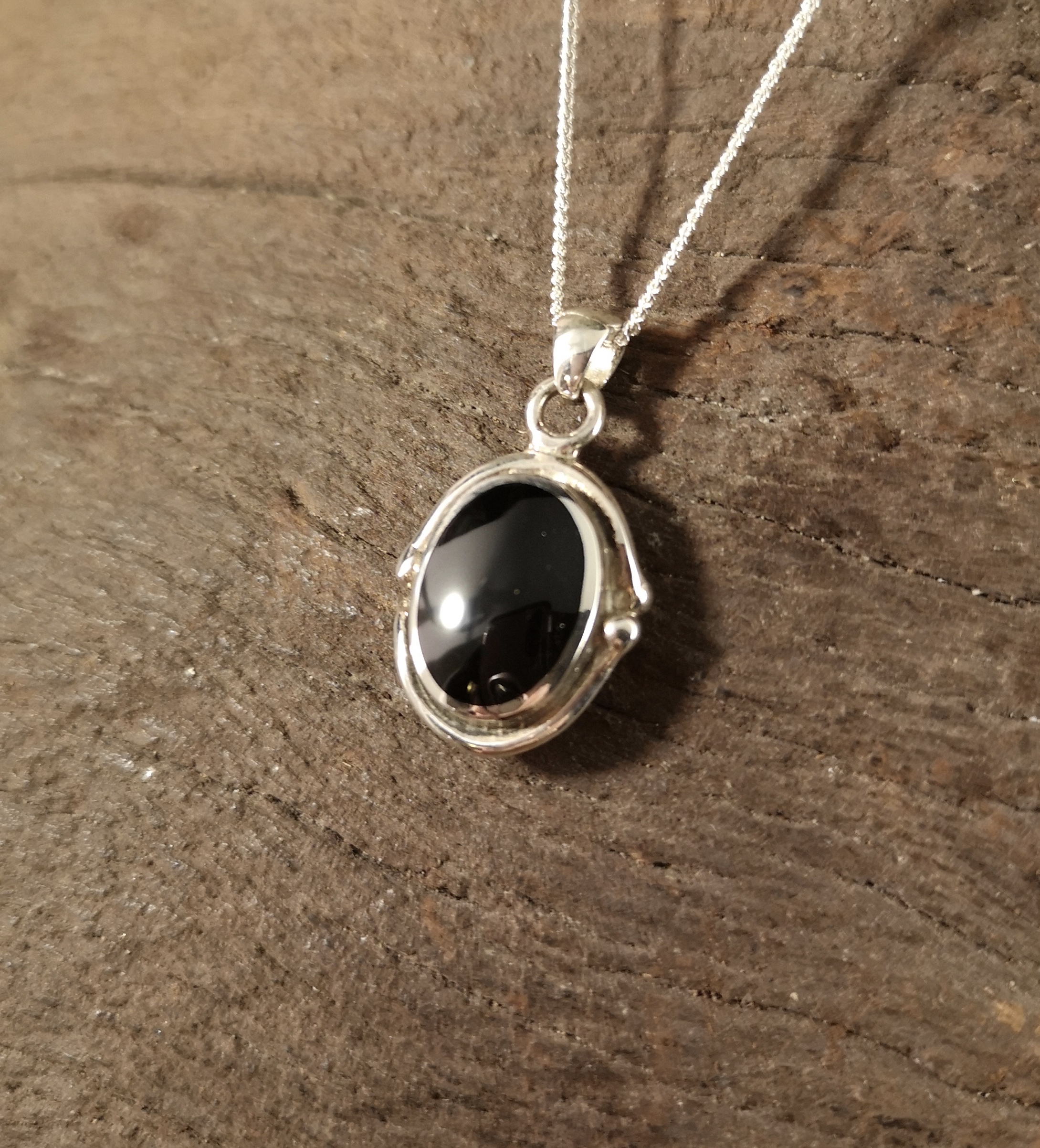 Medium swirl and dot oval pendant