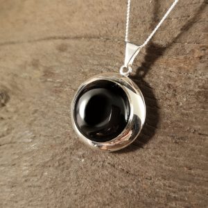 Round sterling silver and Whitby Jet Locket