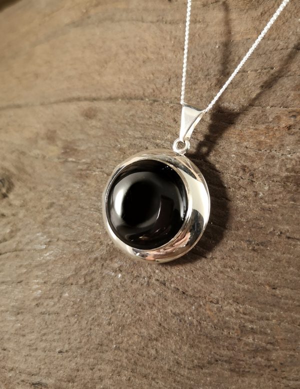 Round sterling silver and Whitby Jet Locket