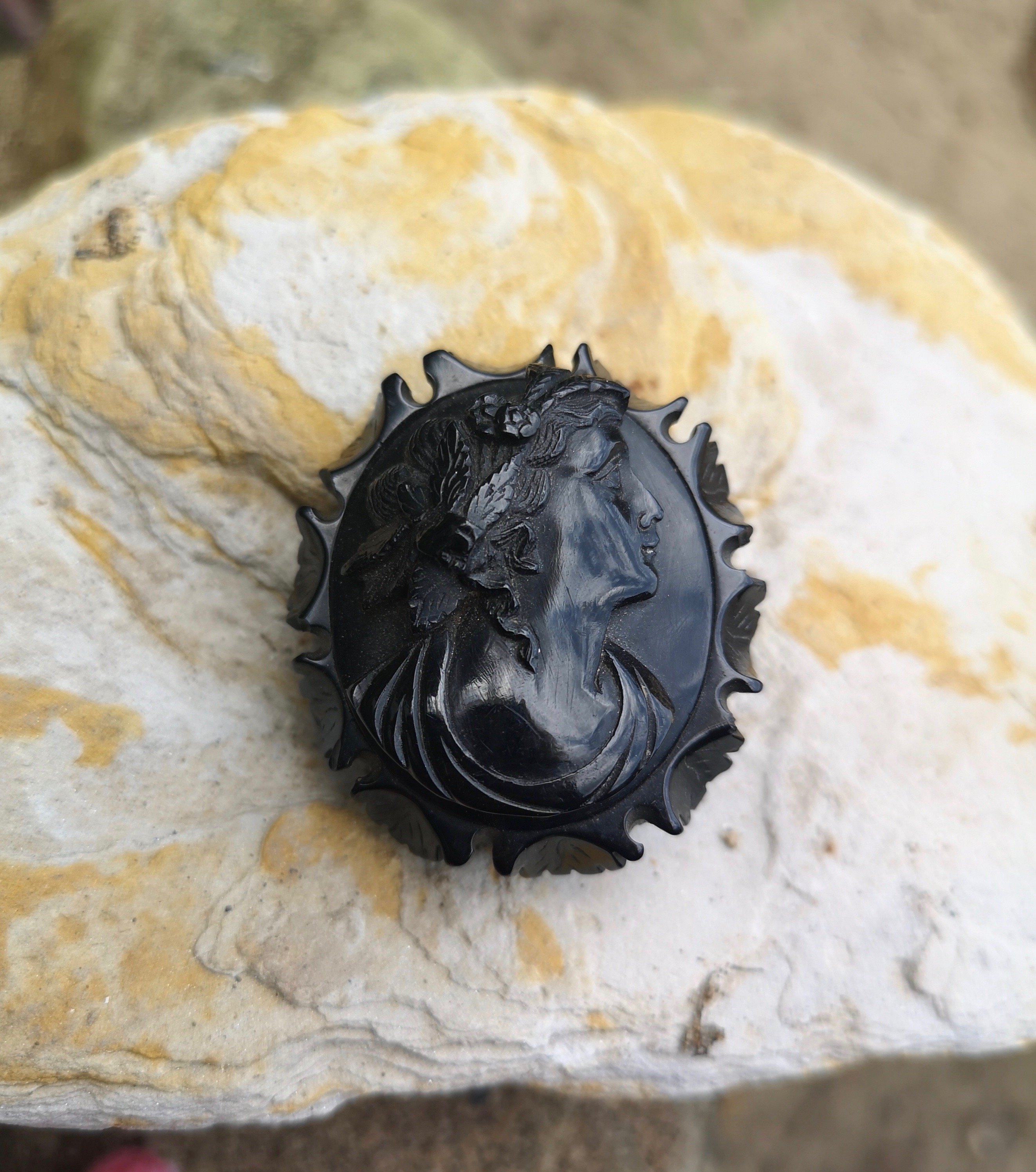 Antique Whitby Jet brooch “lady with leaves in her hair”