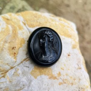 Antique Whitby Jet Cameo brooch.