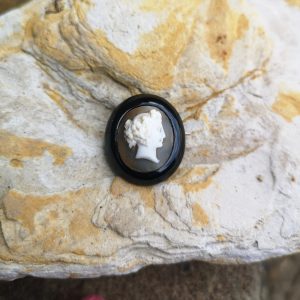 Antique Whitby Jet carved cameo brooch.