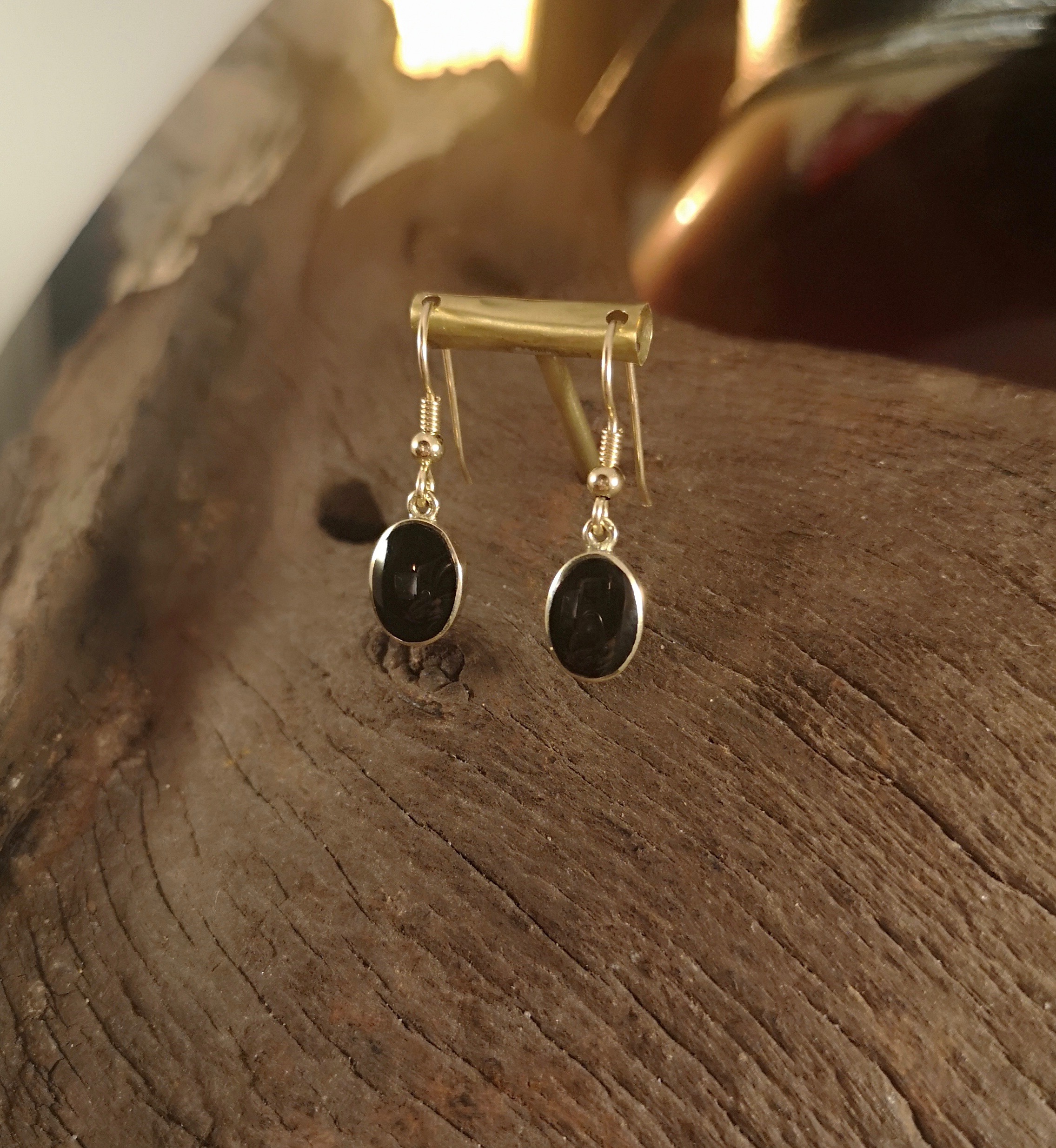 Oval, gold and Whitby Jet earrings.
