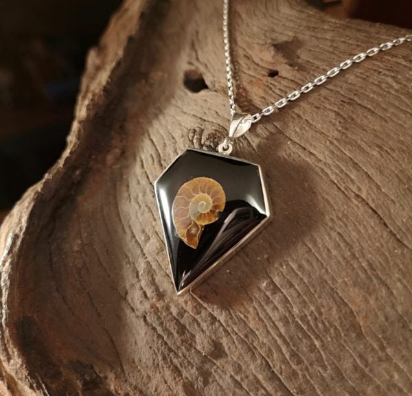Diamond shaped Whitby Jet pendant with Ammonite inlay.