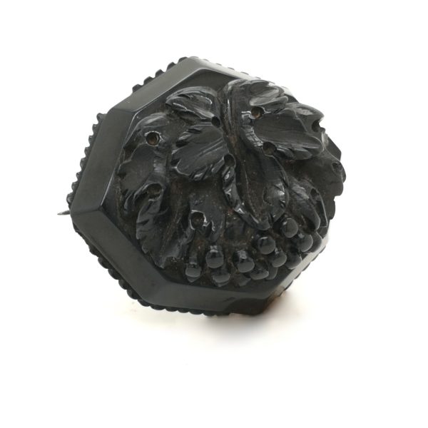 Antique Victorian Whitby Jet carved brooch. Carved with grapes which represent "Christ"