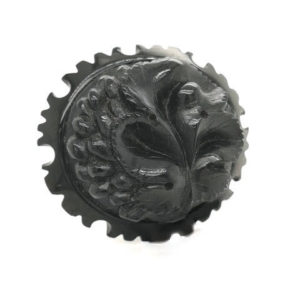 Antique Victorian Whitby Jet brooch with floral symbolic carving.