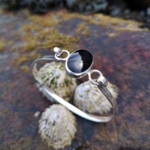 Whitby Jet Bangle set in an oval sterling silver setting
