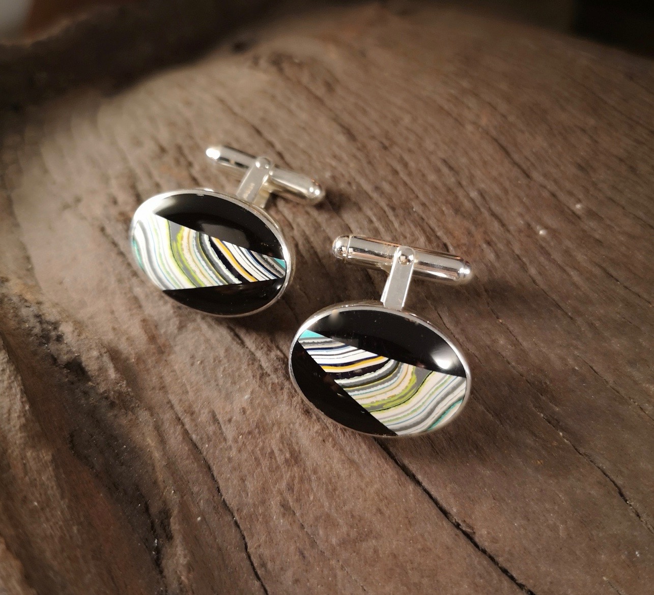 Oval Cufflink with Fordite and Whitby Jet