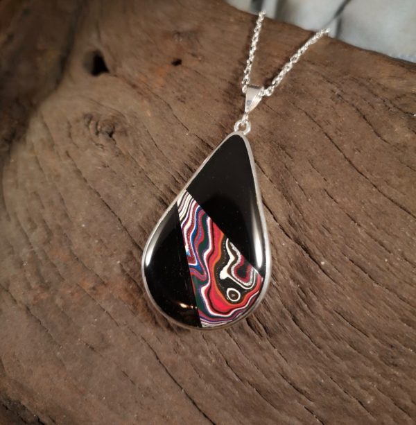 Large Fordite and Whitby Jet pendant