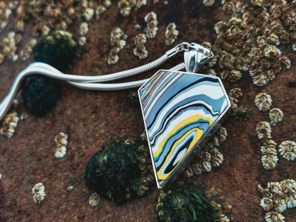 Fordite Pendant with Whitby Jet double sided pendant