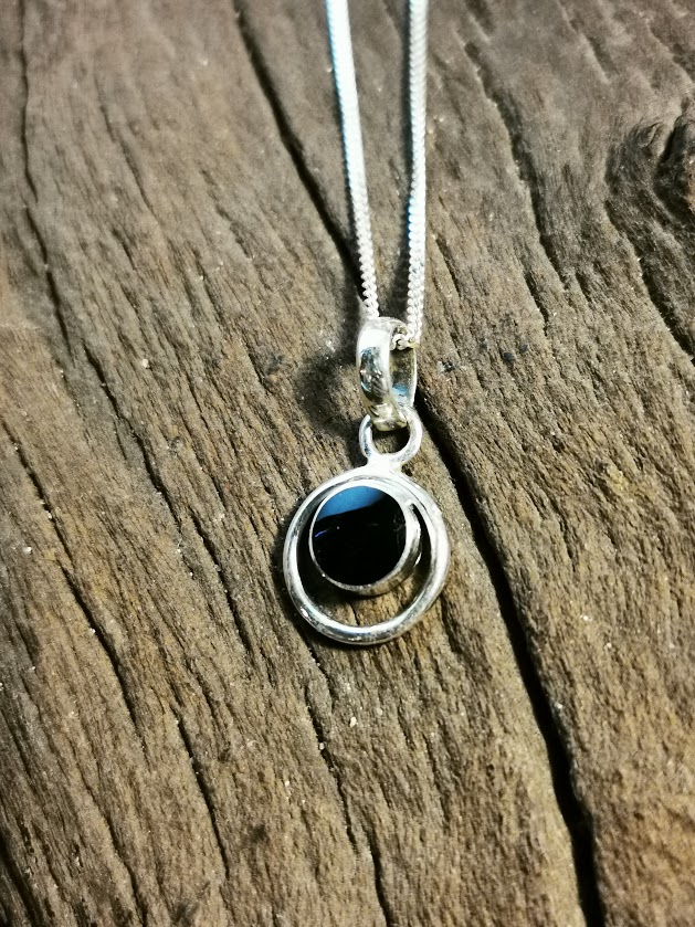 Small round halo pendant