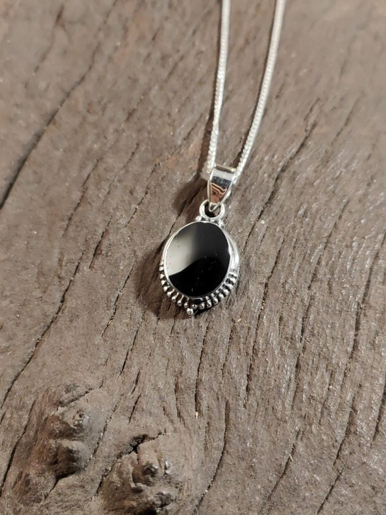 Medium half dot oval pendant