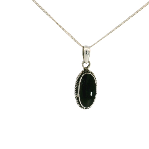 A classic Whitby jet and sterling silver pendant